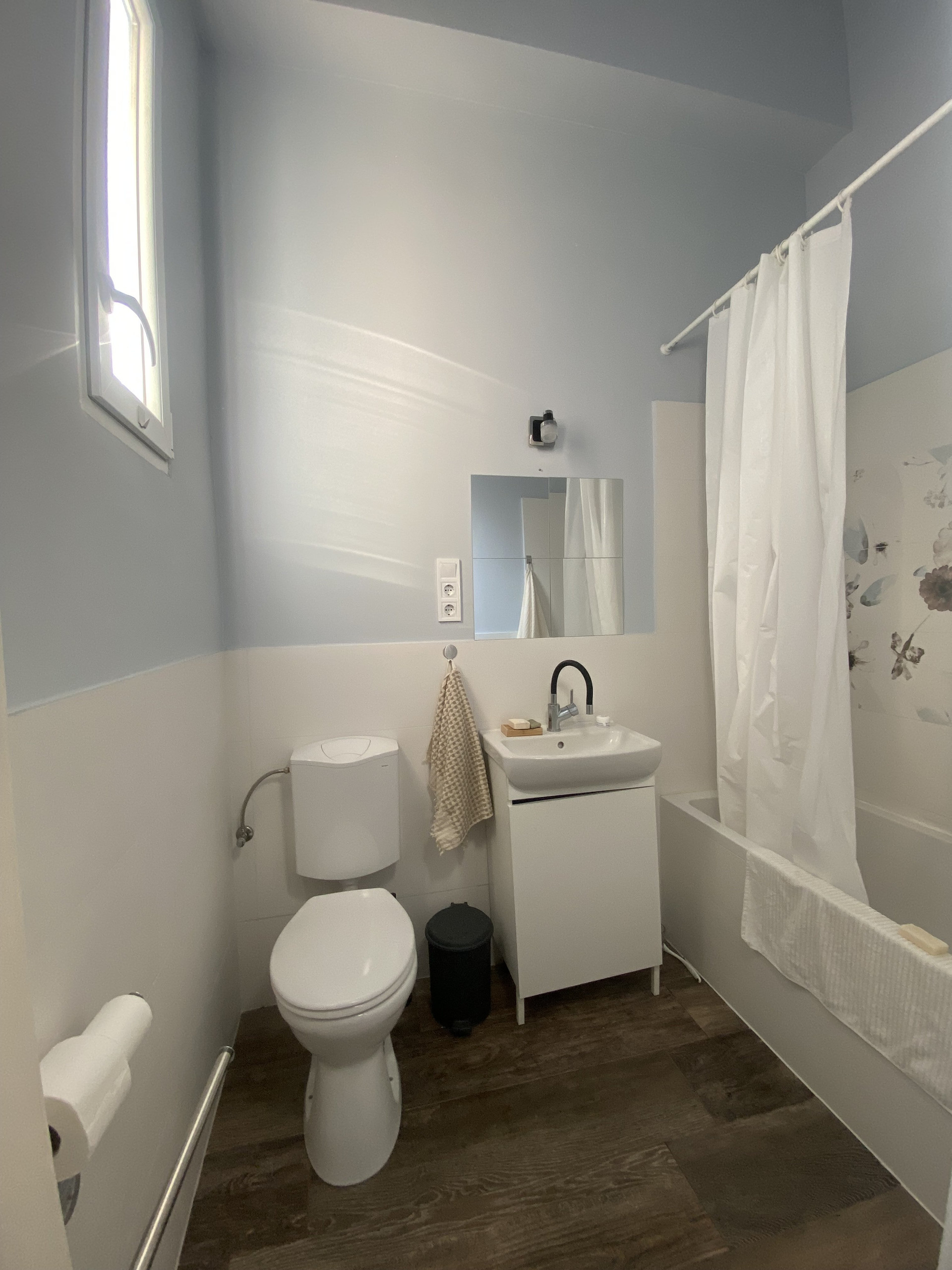 Bathroom with bathtub and toilet
