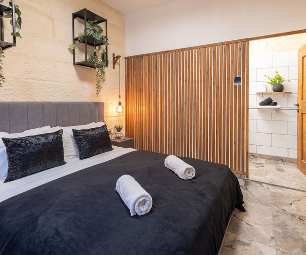 Bedroom with ensuite bathroom view