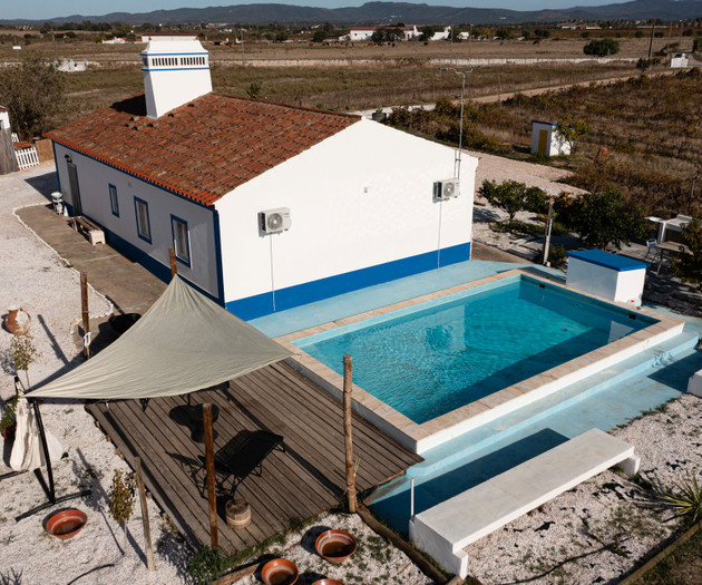 Pool, deck and shade sail
