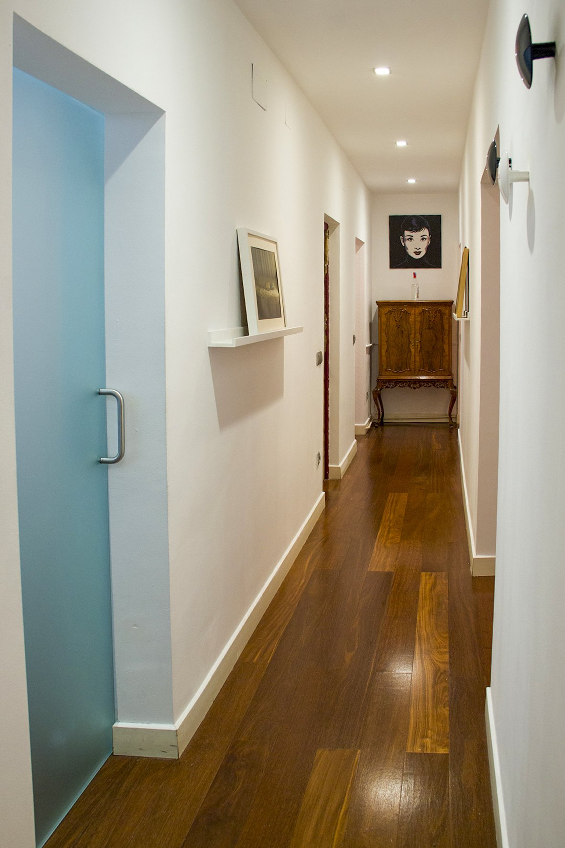 Hallway with wood flooring