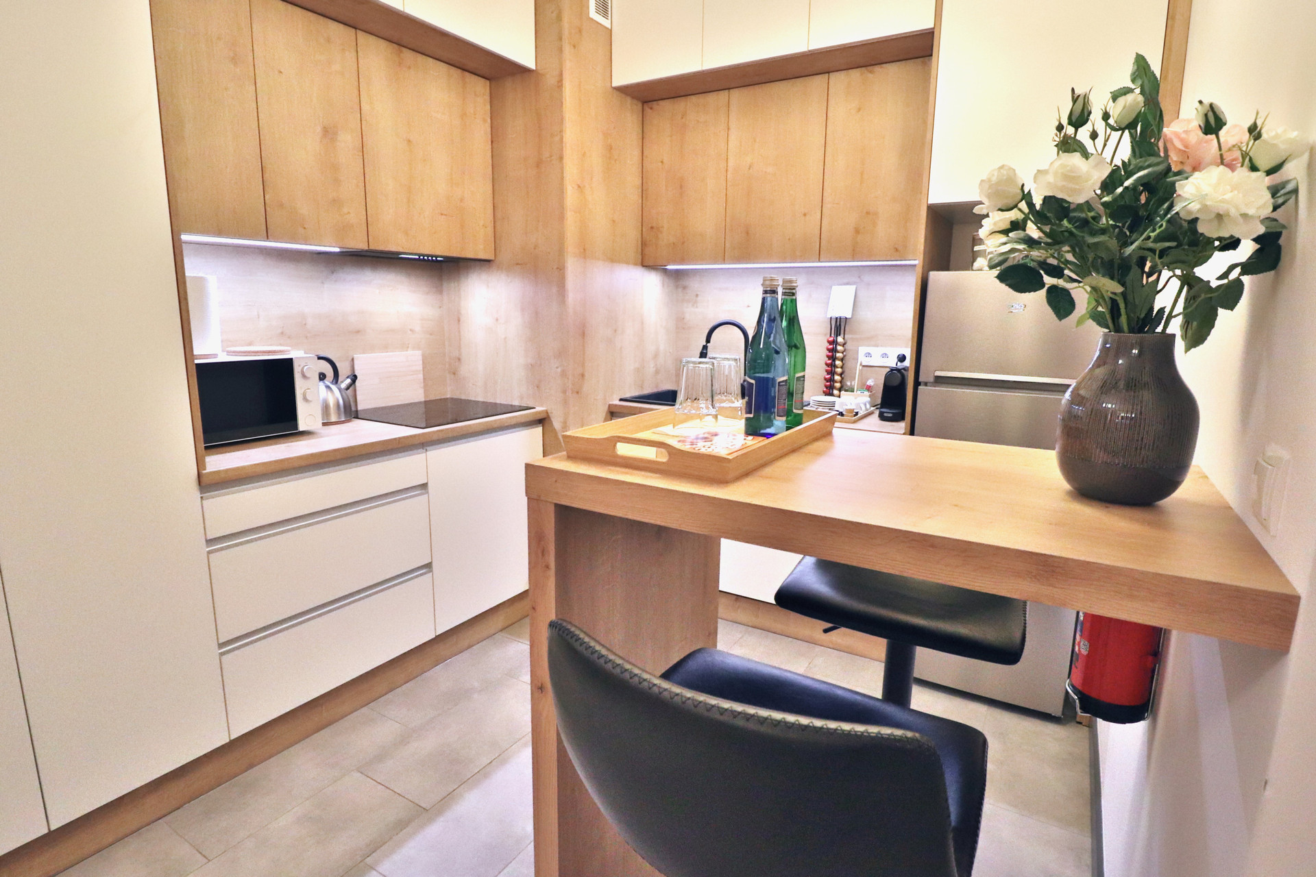 Kitchen with bar counter and appliances