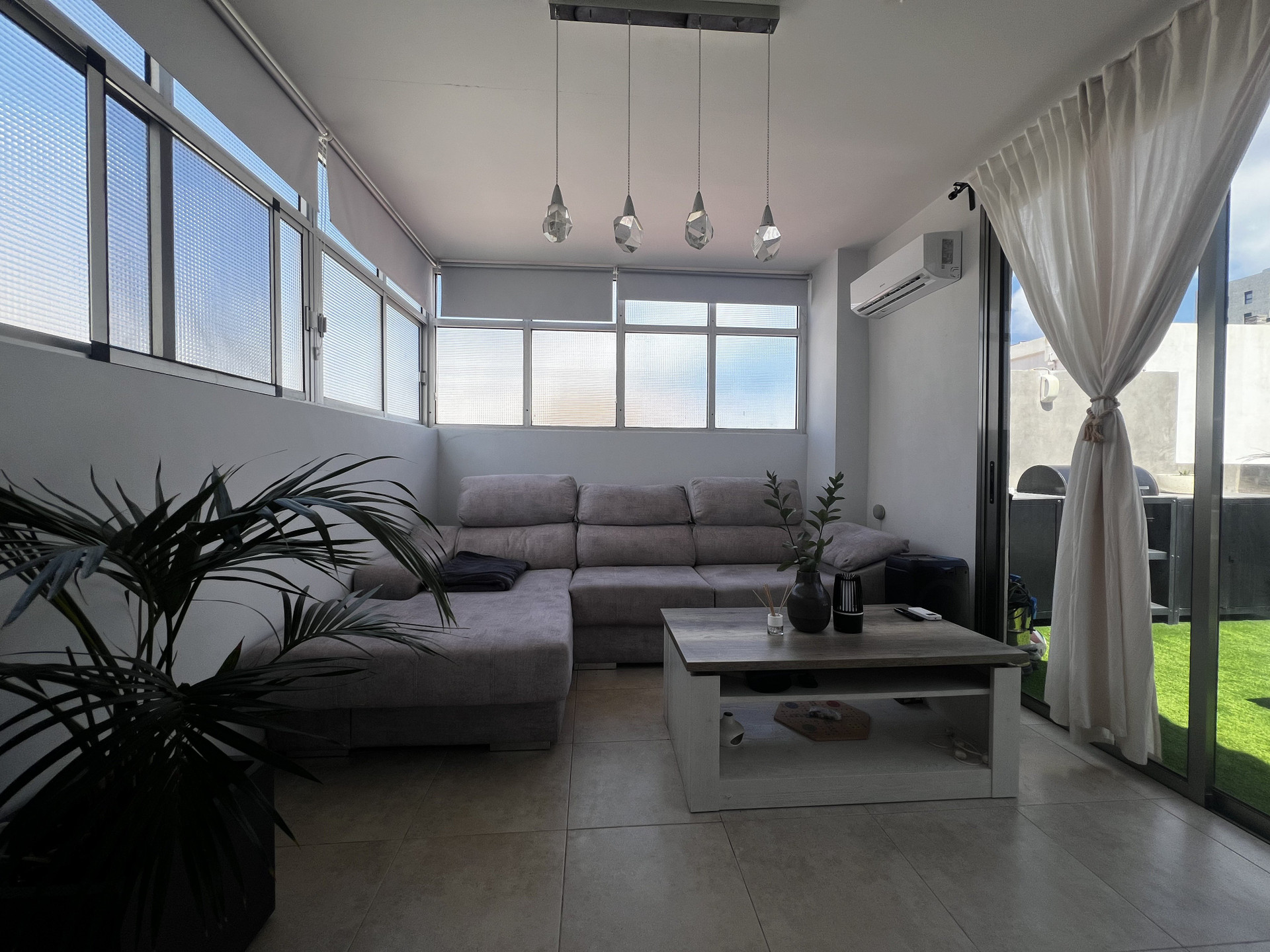 Bright living room with sectional sofa