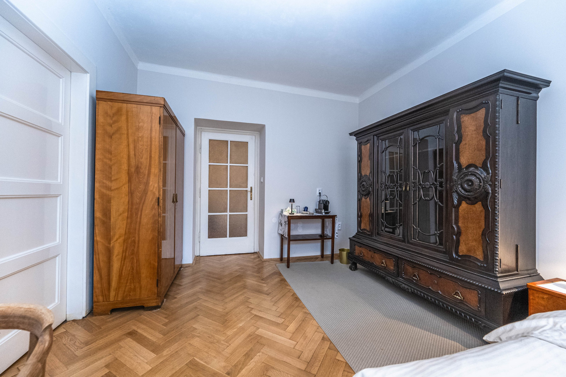 Bedroom with vintage carved wardrobes