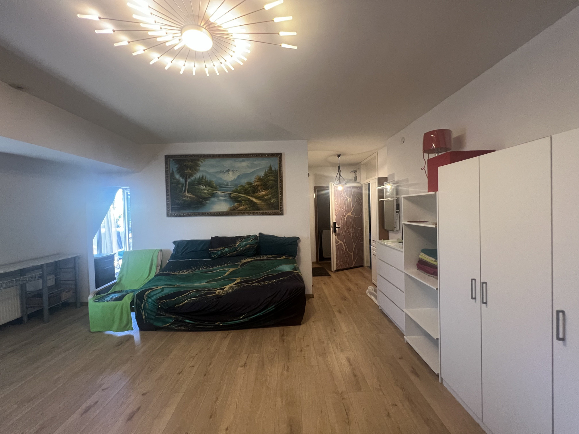 Bedroom with wardrobe and sofa bed