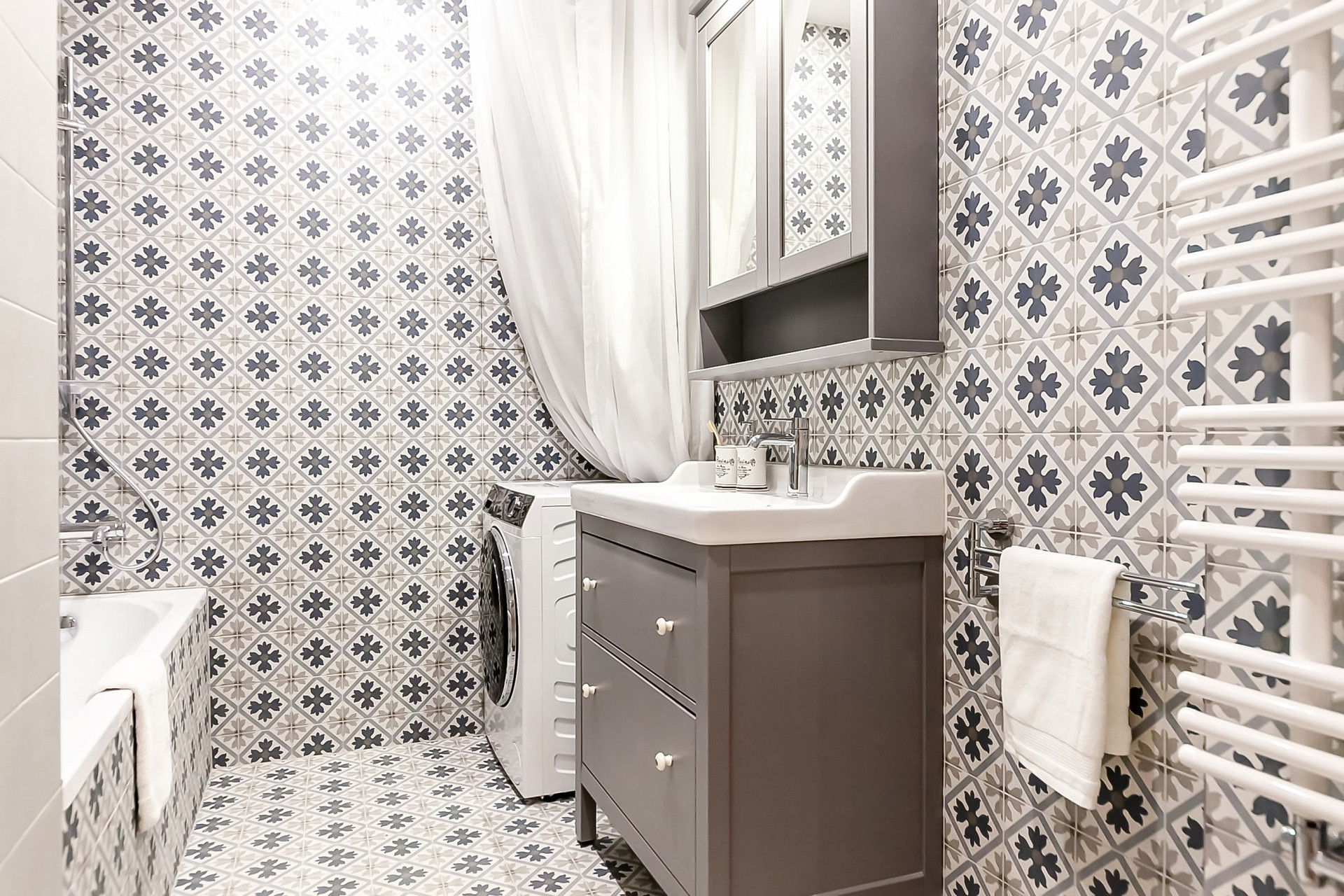 Bathroom with tub vanity washing machine