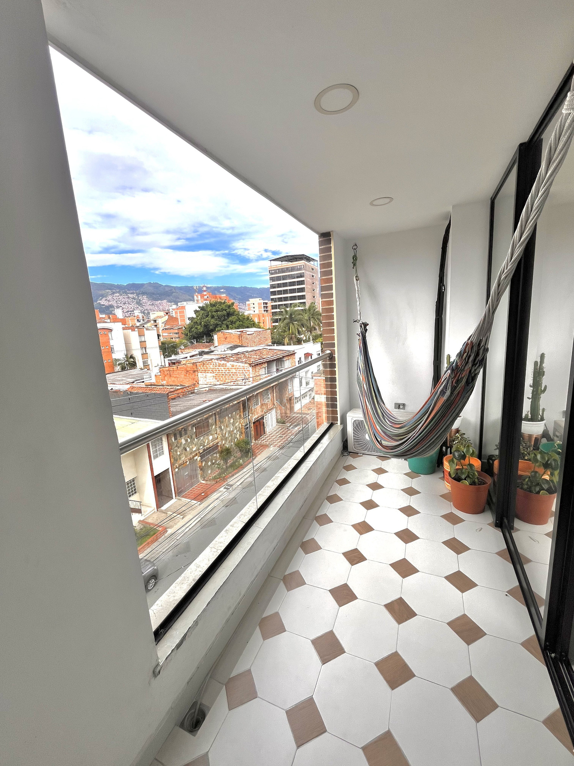 Balcony hammock with city view