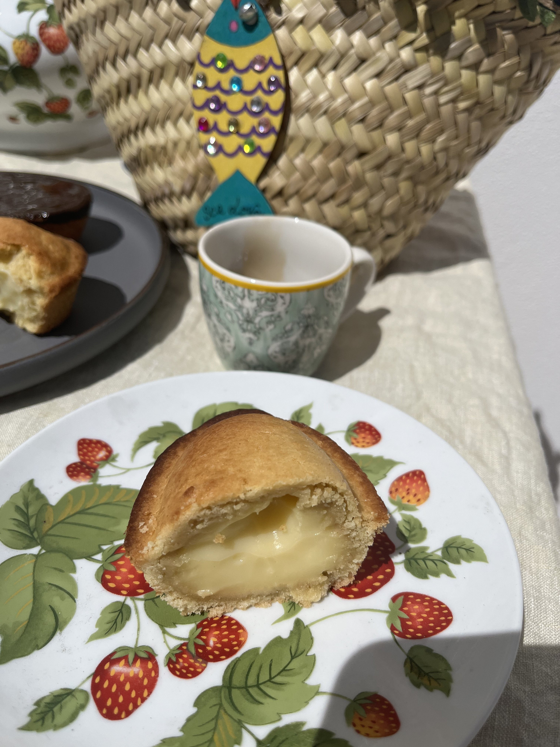 Pastry and coffee cup on table