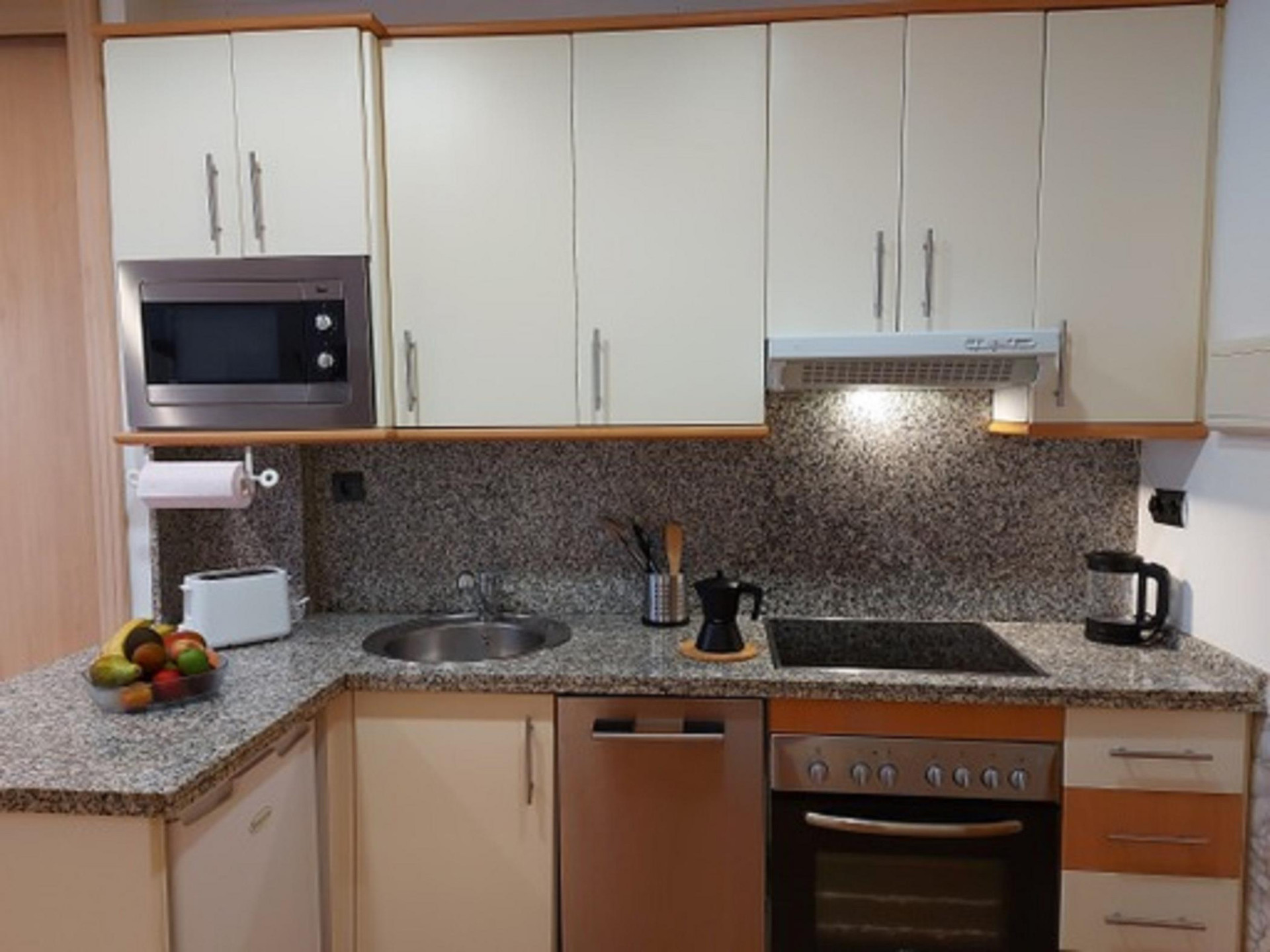 Full kitchen with oven