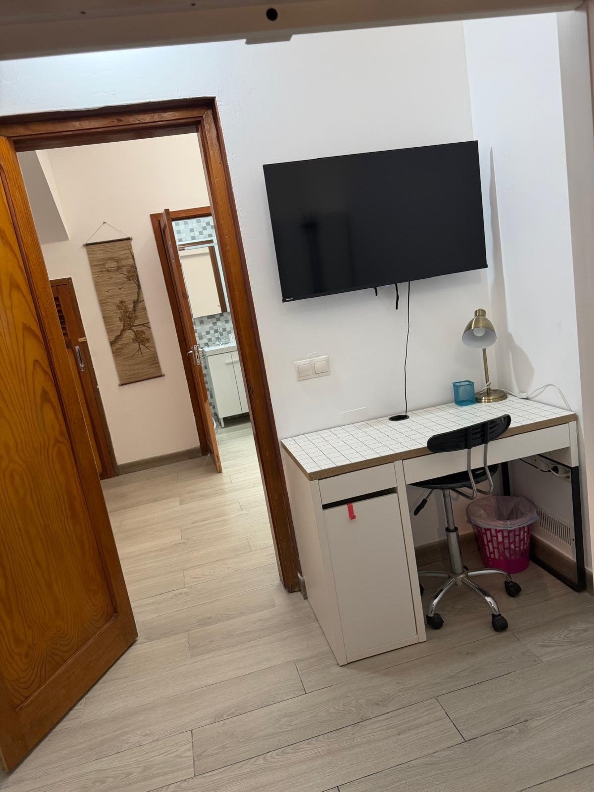 Bedroom desk with TV