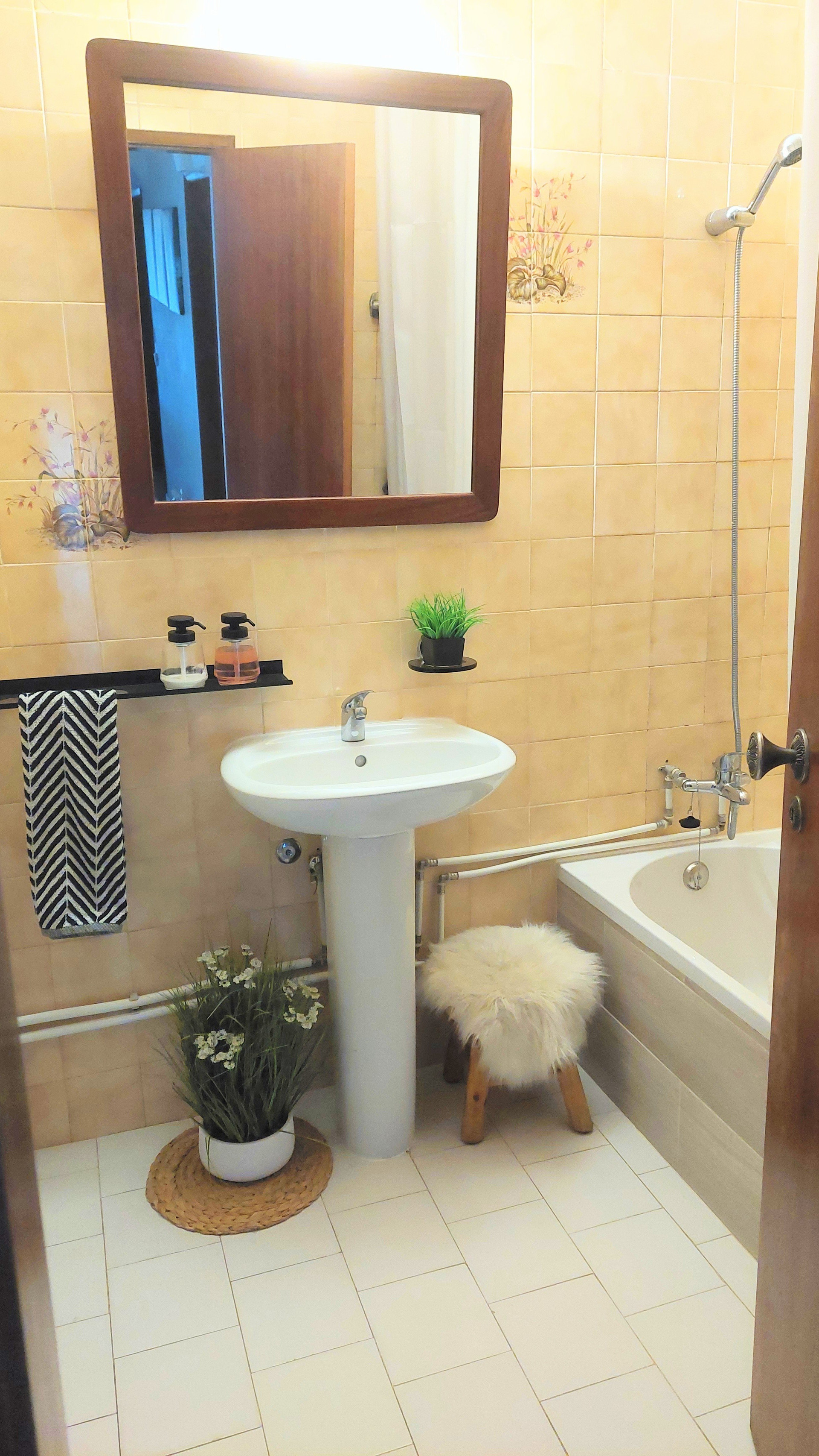 Bathroom with sink and tub