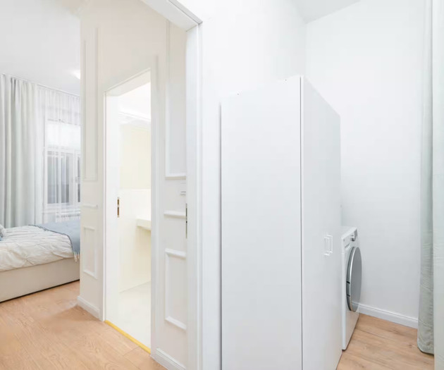 Laundry area with washer
