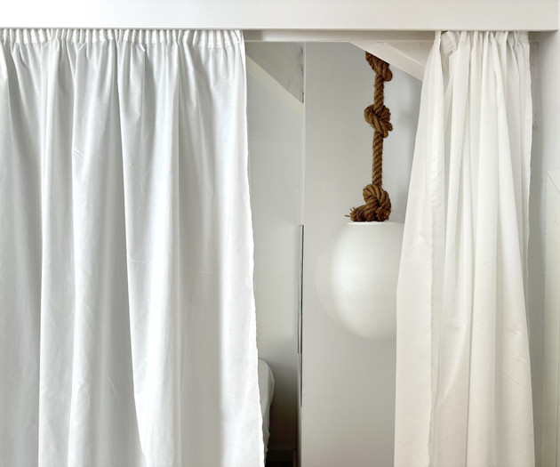 White curtains room divider detail
