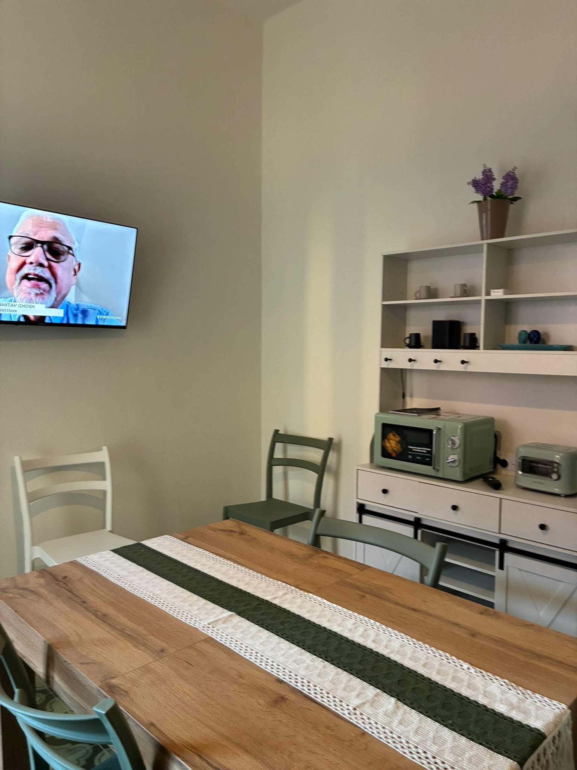 Kitchen and small lounge with sofa
