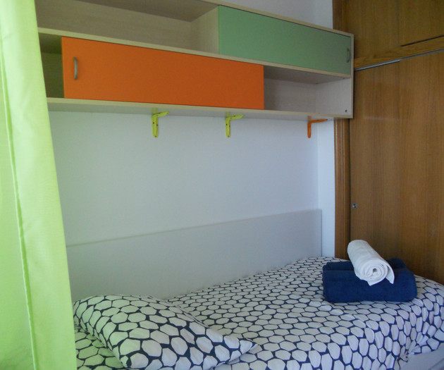 Single bed with wardrobe