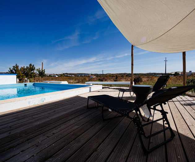 Deck loungers overlooking pool