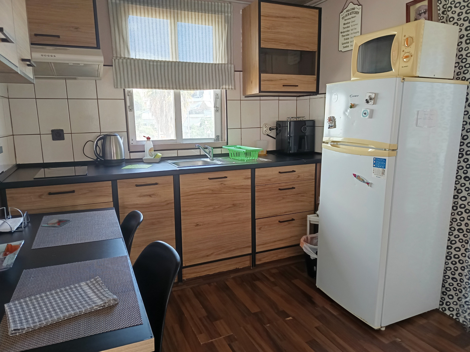 Kitchen with wooden cabinets refrigerator
