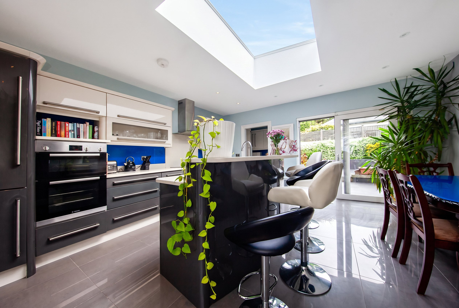 Modern kitchen with skylight and island