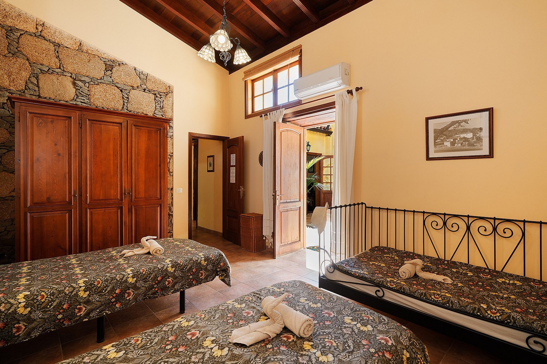 Bedroom with stone wall wardrobe