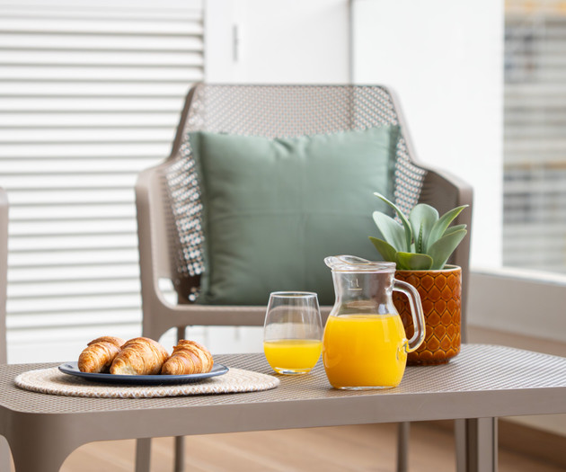Balcony table with breakfast