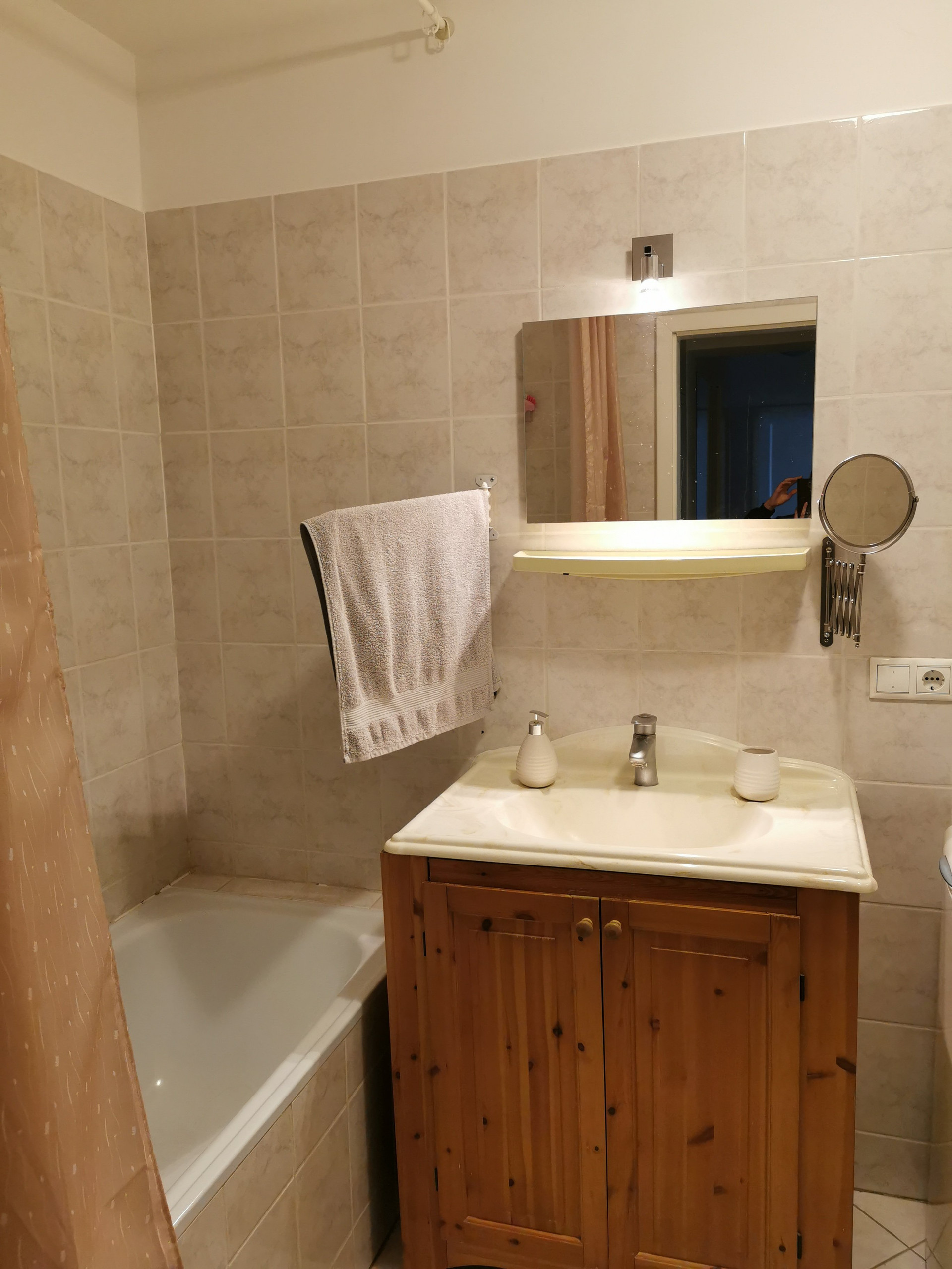 Bathroom with tub and sink