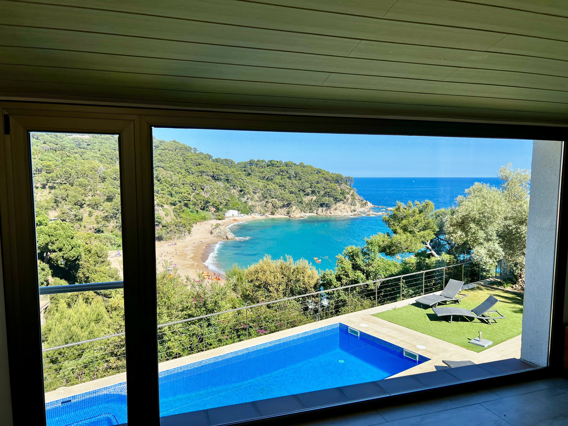 Sea view through large living window