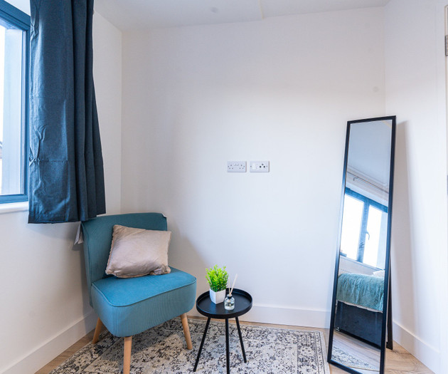 Bedroom reading corner with chair
