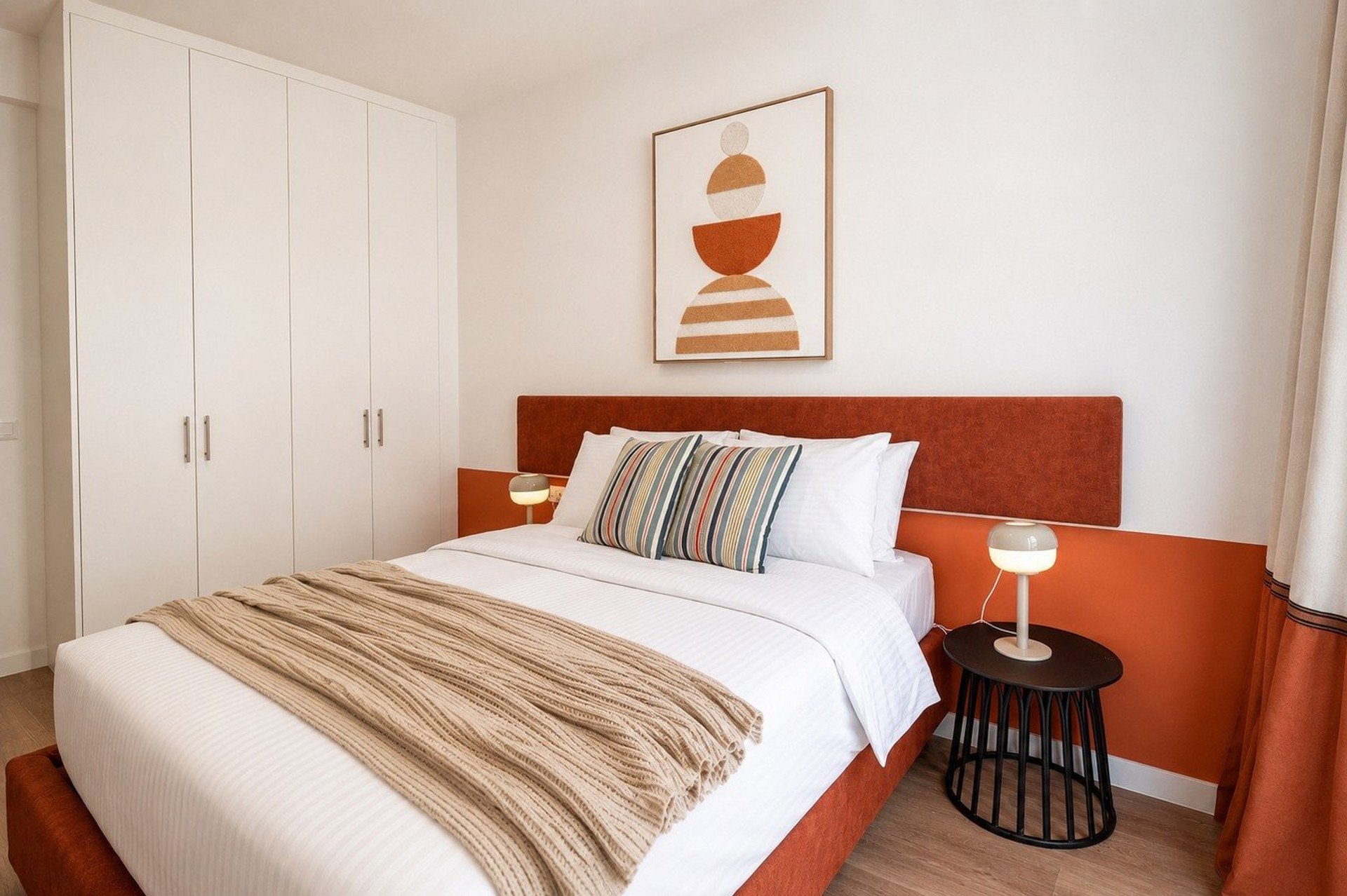 Bedroom with orange headboard