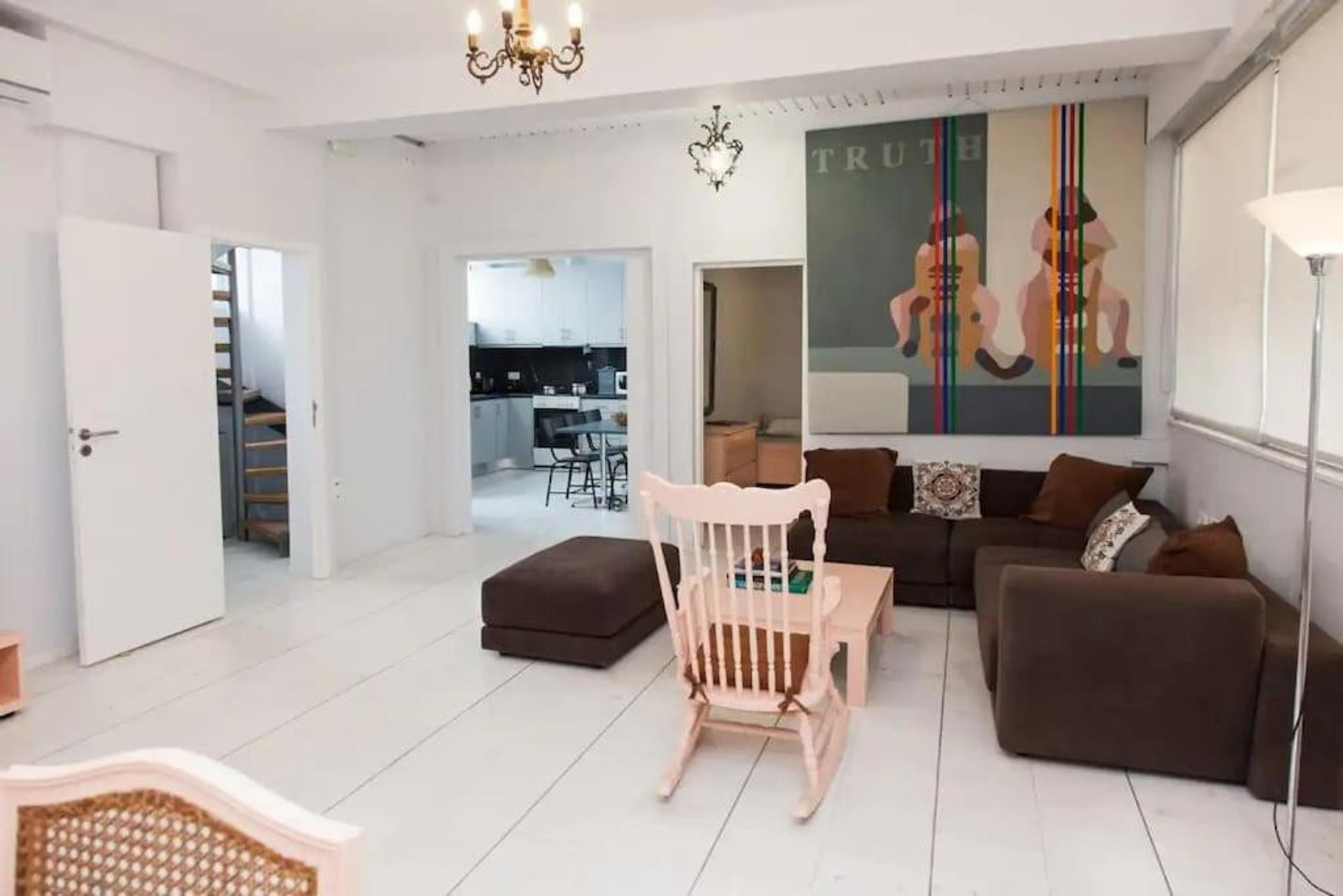 Living room with tasteful furnishings and cosy sitting area