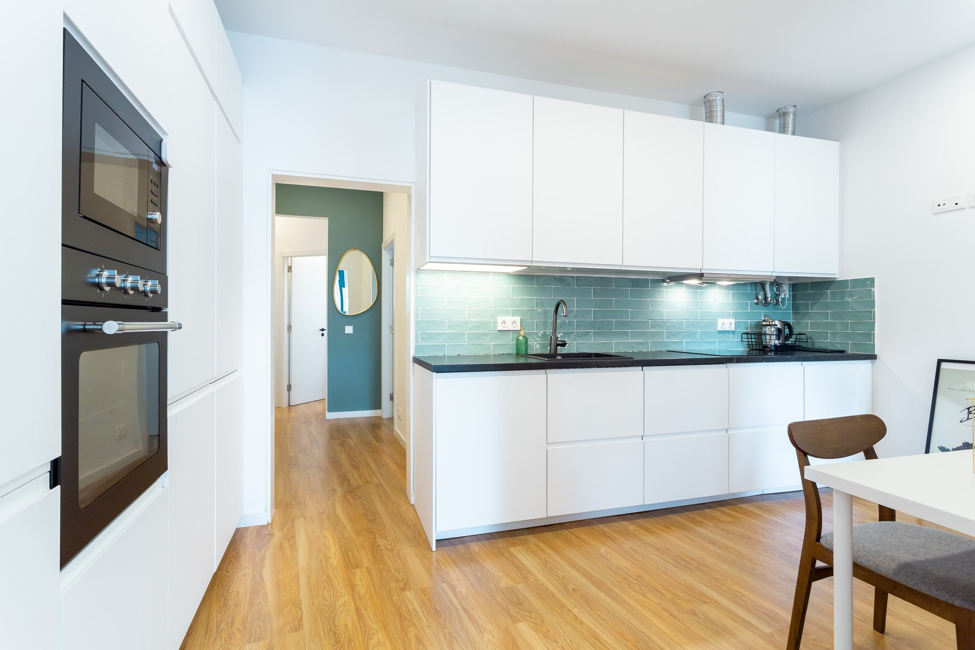 Modern white kitchen with oven
