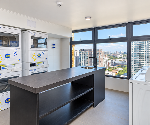 Shared laundry room with view