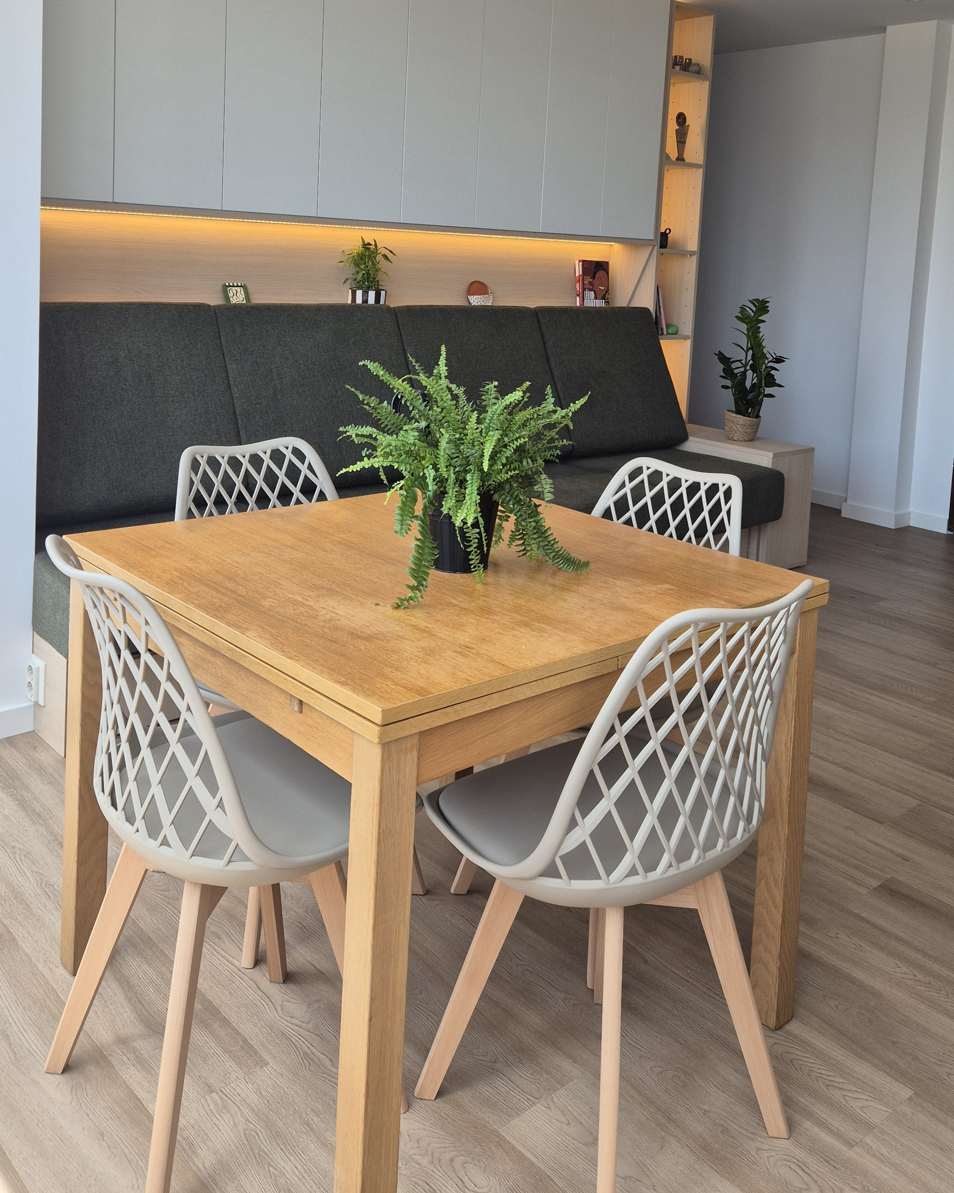 Dining area with sofa behind