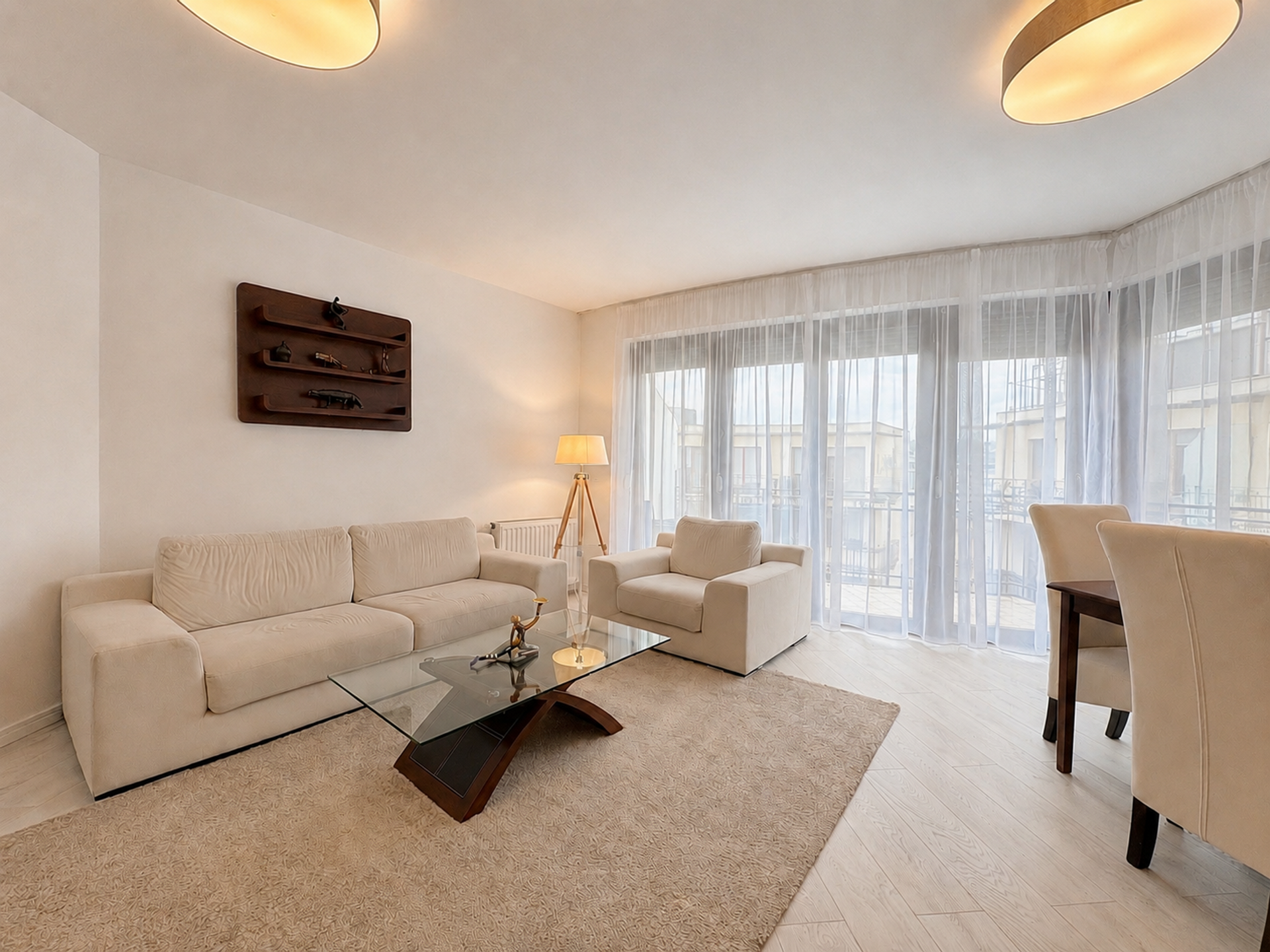 Bright spacious living room with balcony