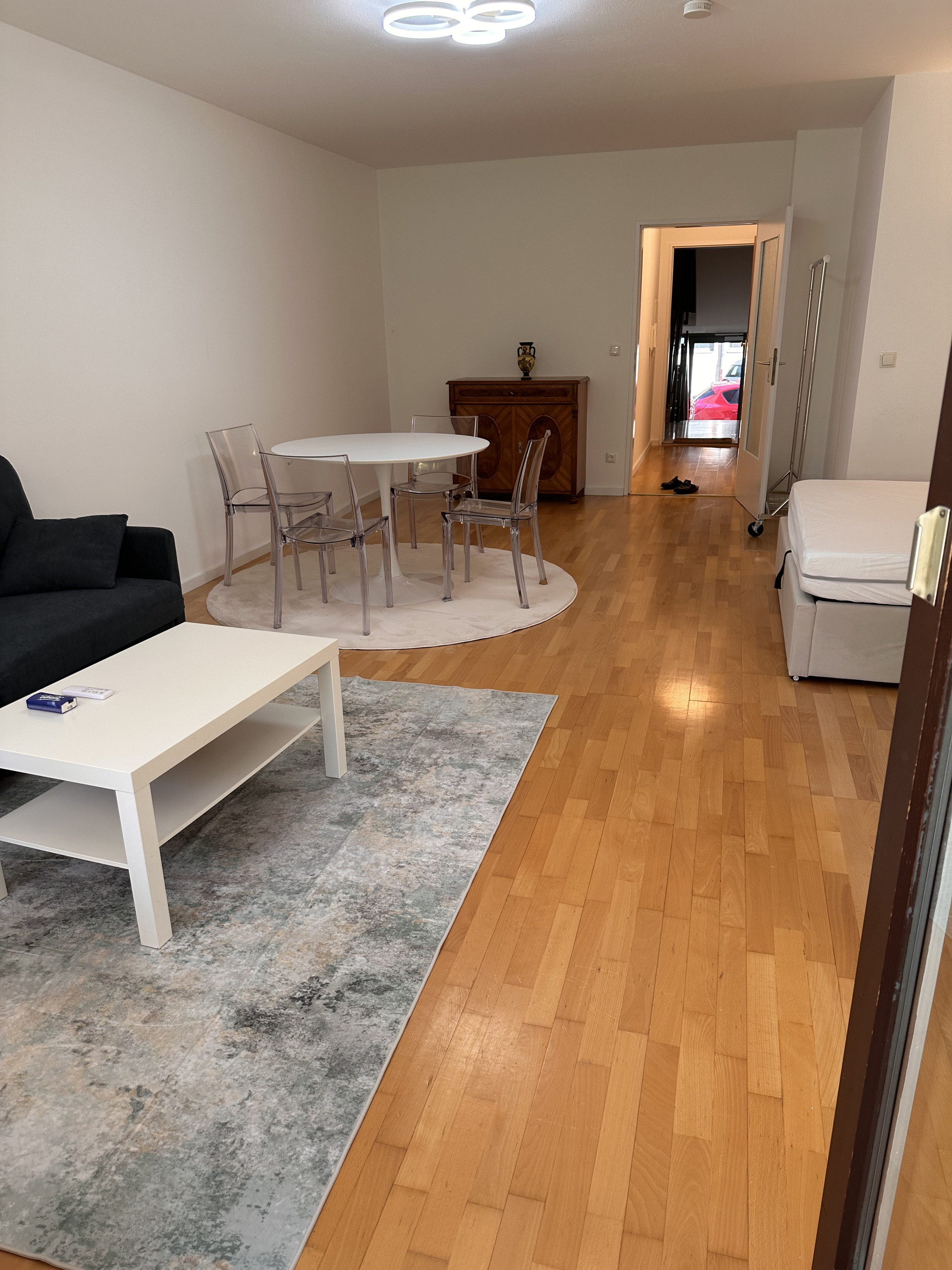 Living room with dining and bed