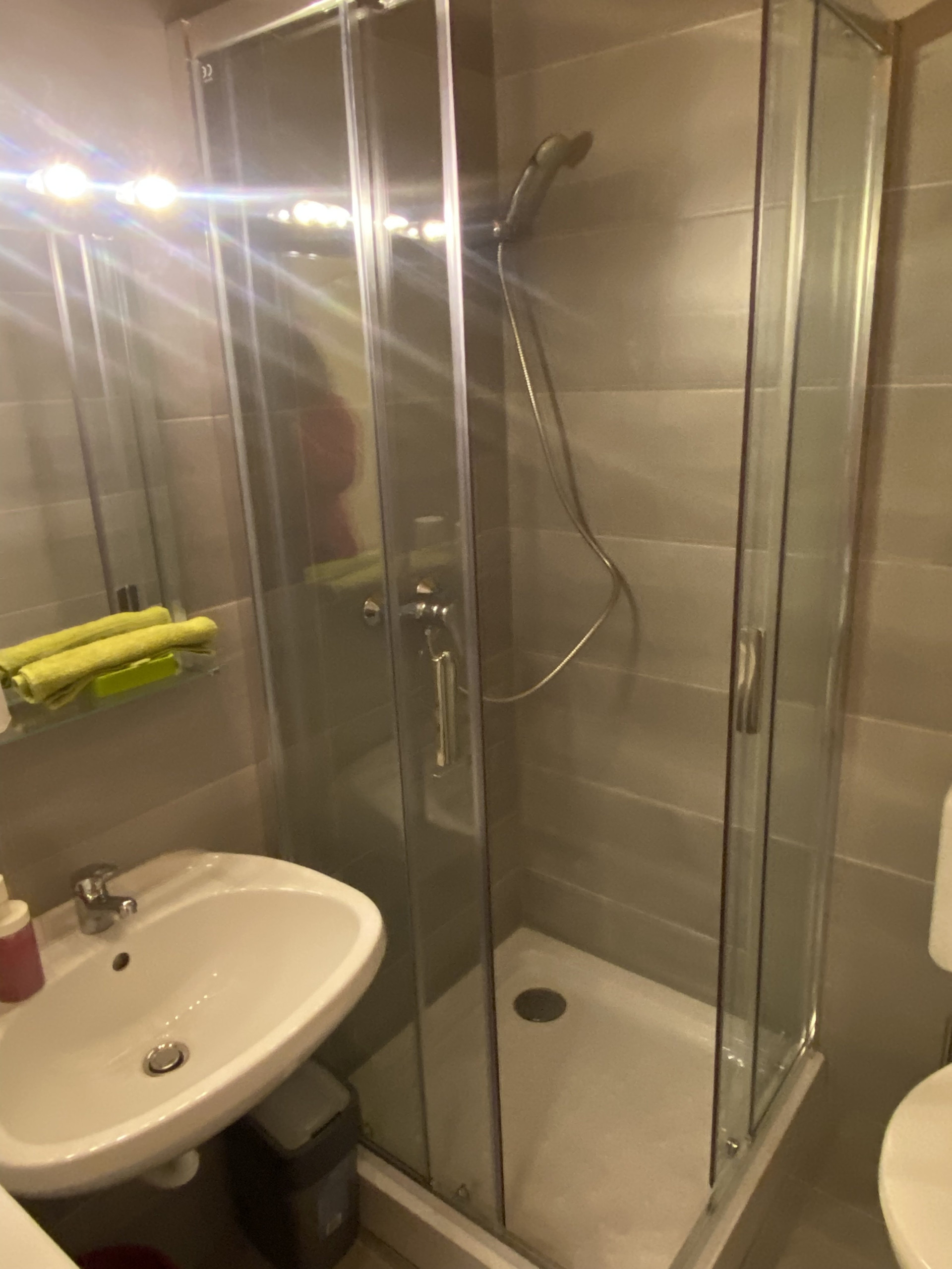 Bathroom with shower and sink