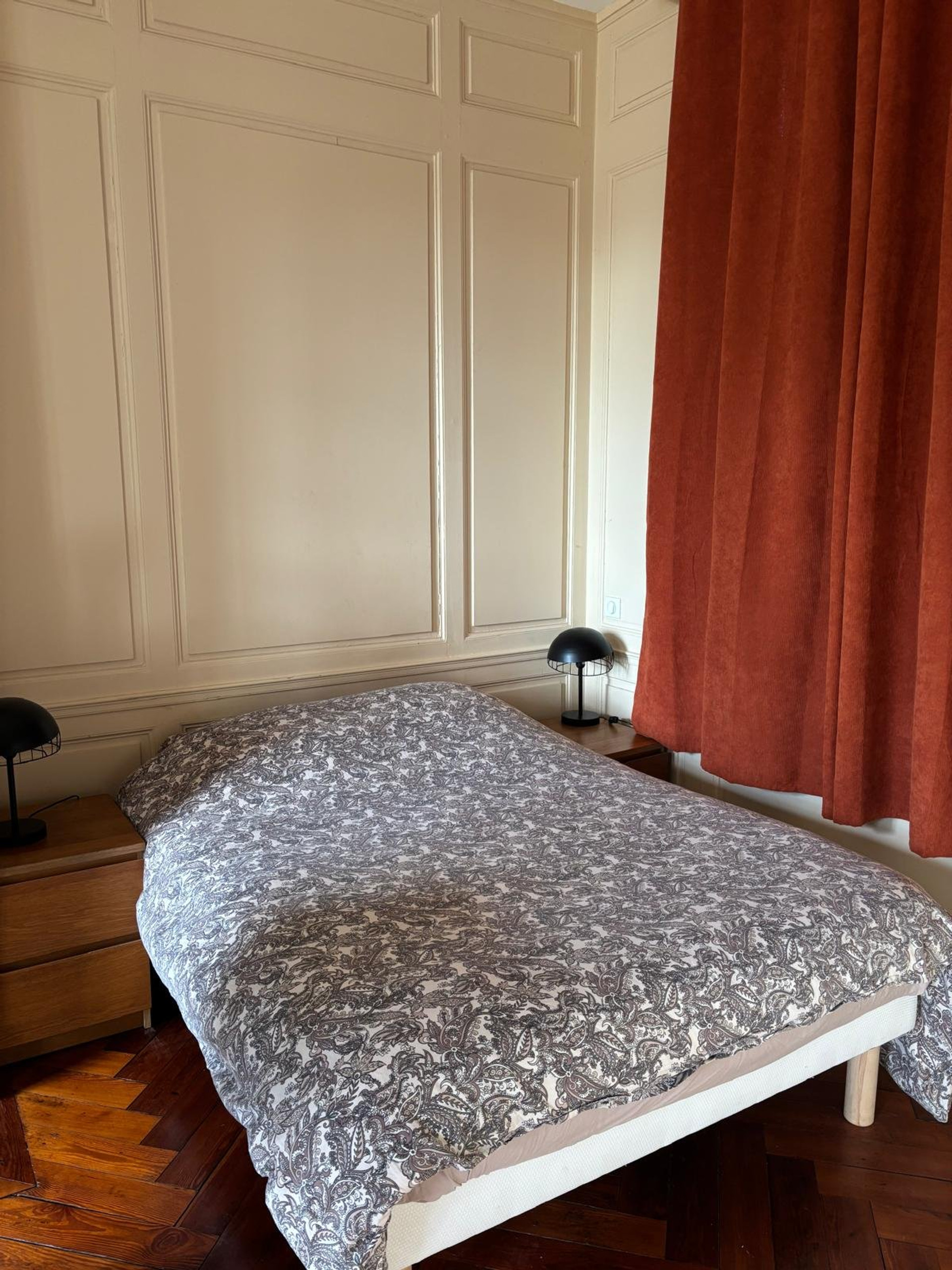 Bedroom with elegant curtains and lamps