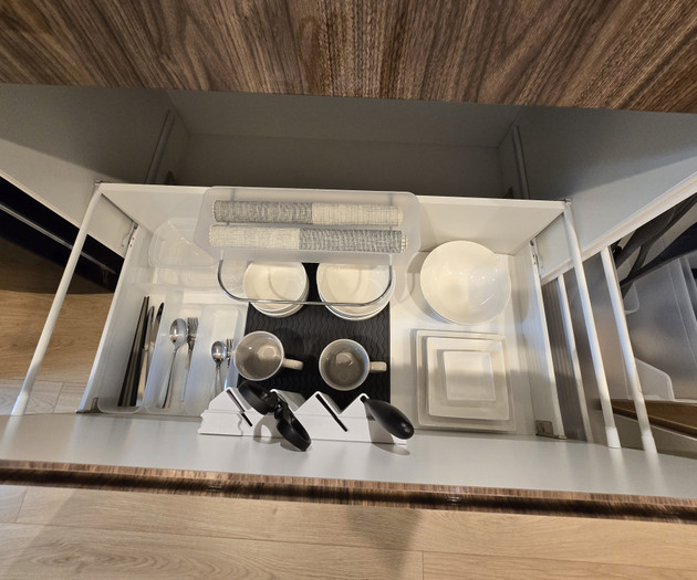 Kitchen drawer with cups plates