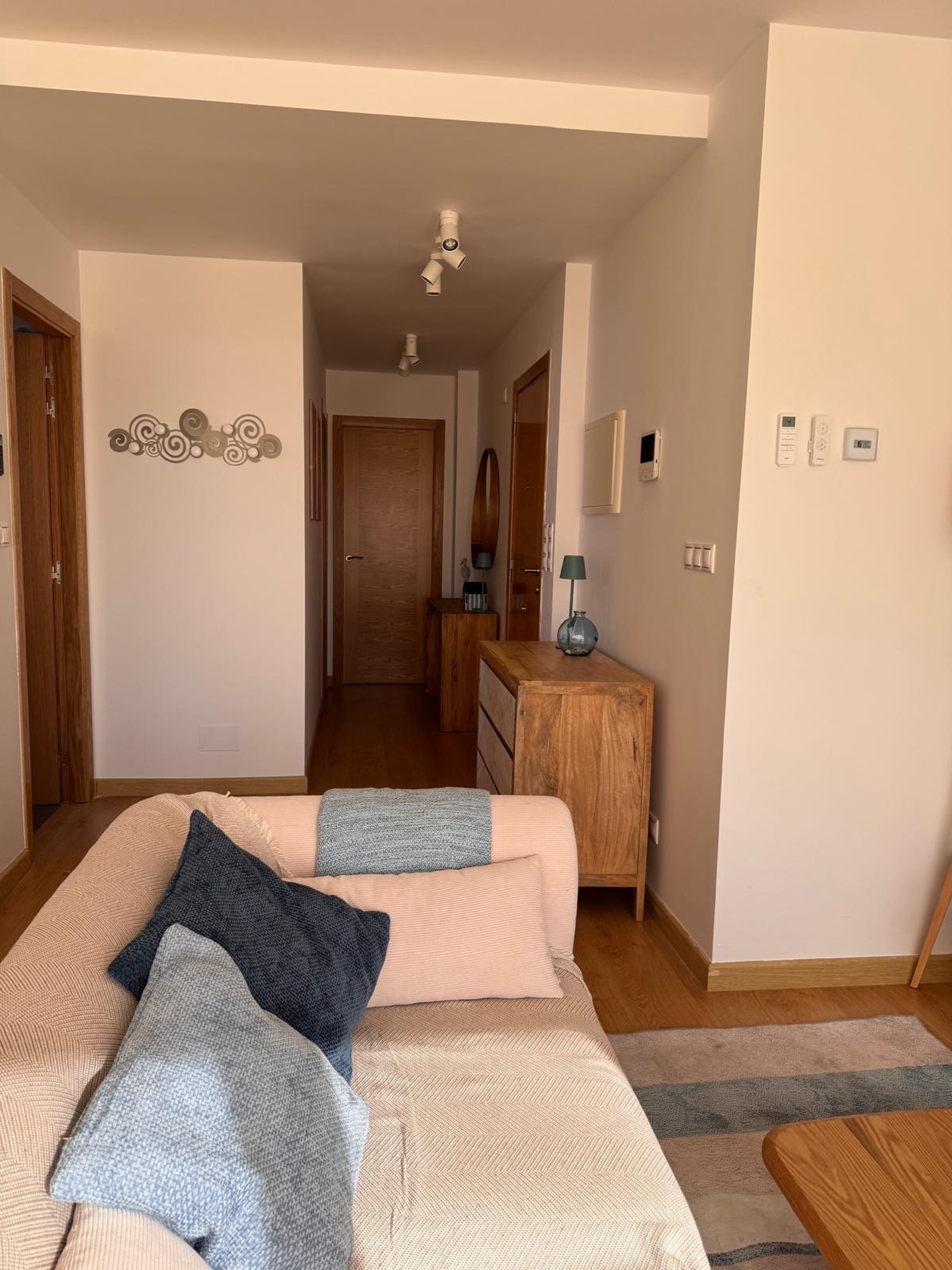 Hallway with wooden dresser