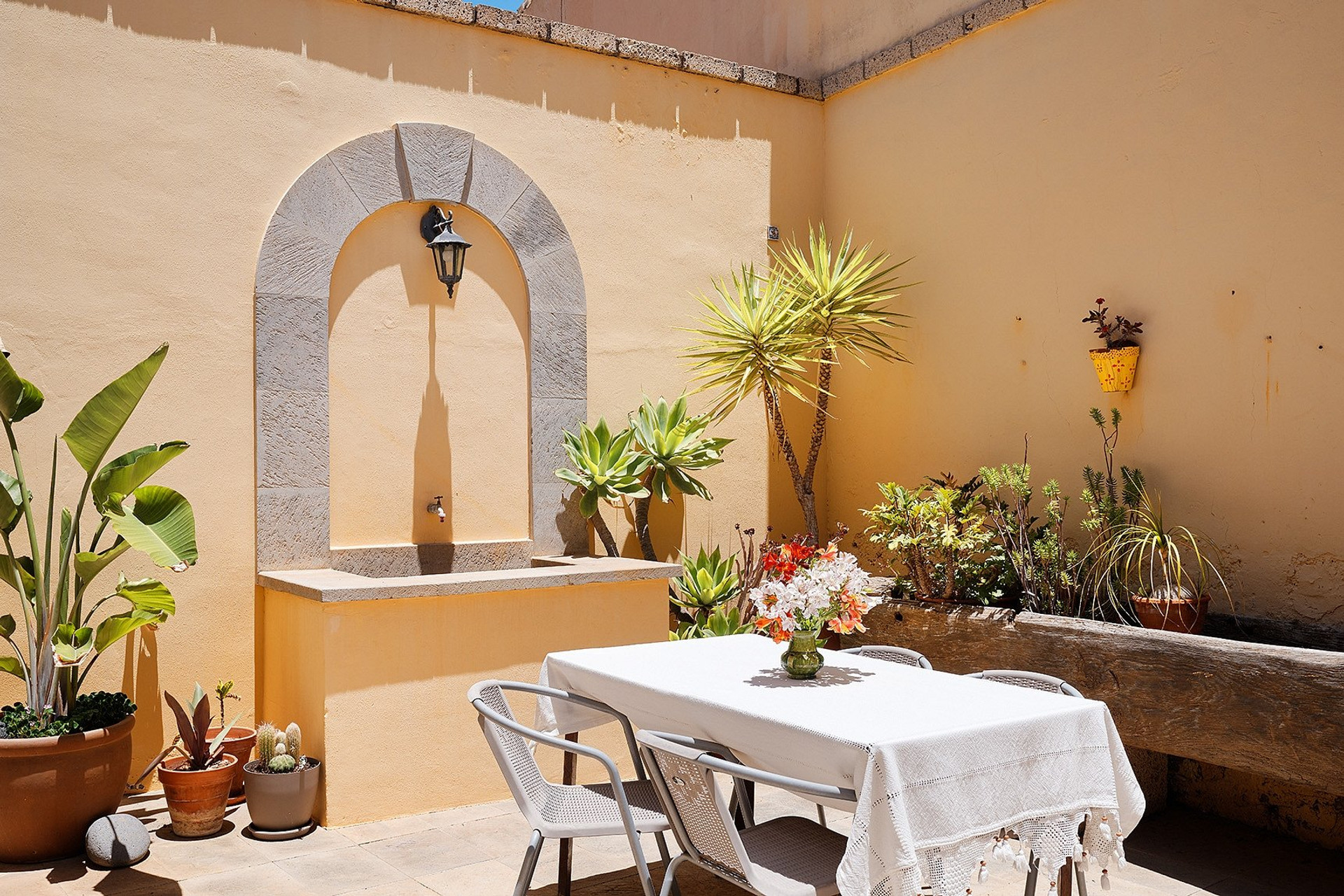 Courtyard dining table and fountain