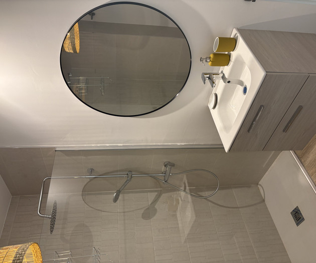Bathroom with mirror and sink