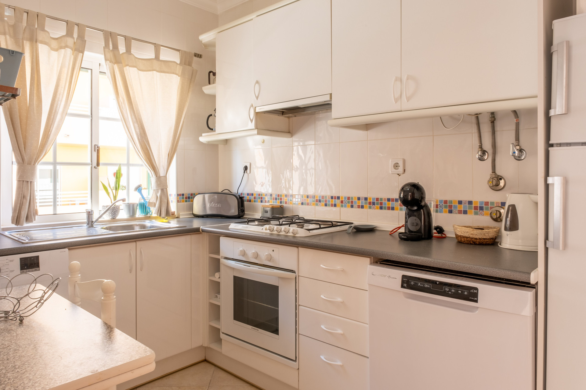 Kitchen with white cabinets