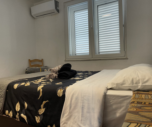 Double bed near window