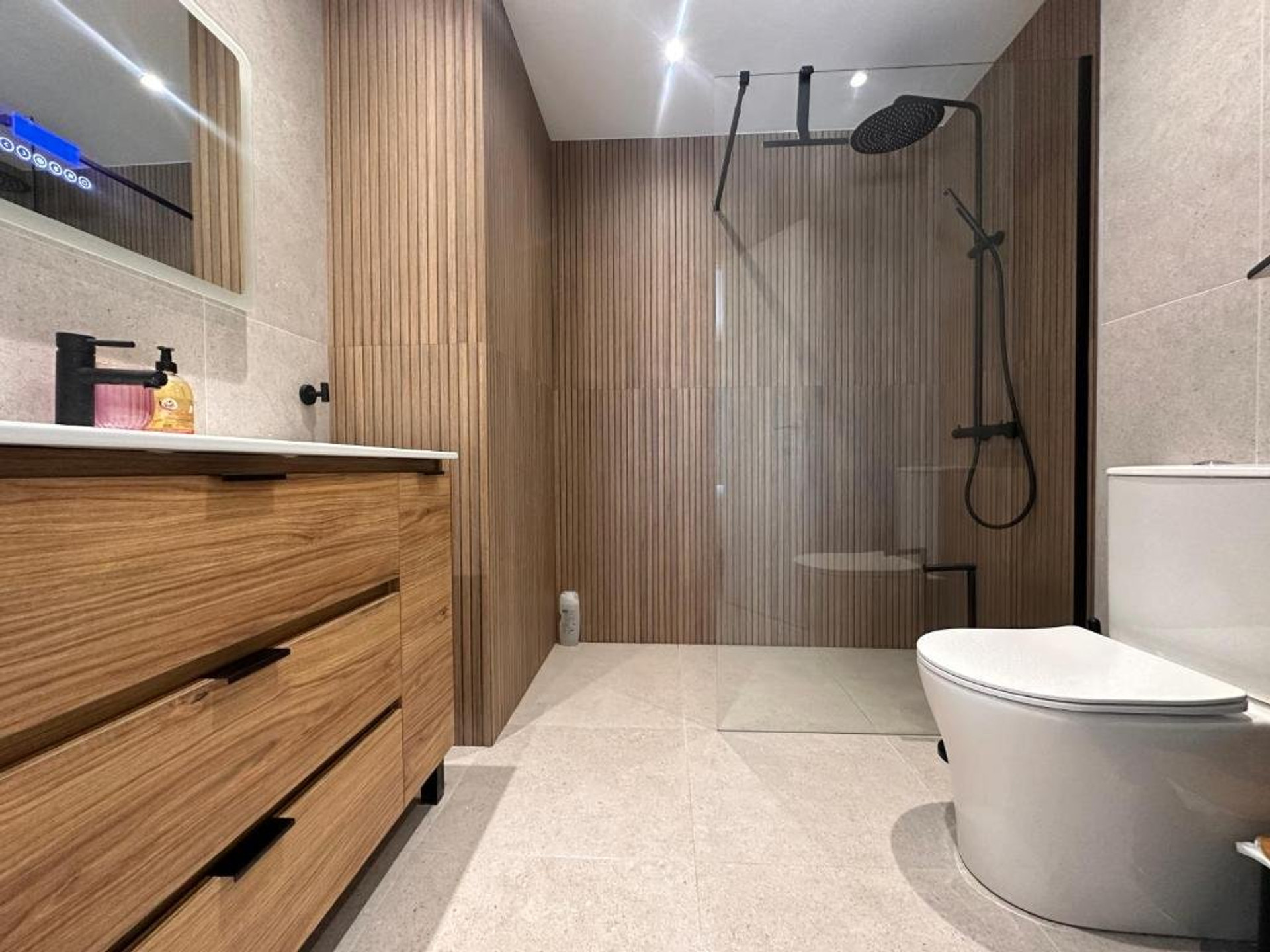 Bathroom with walk-in rain shower