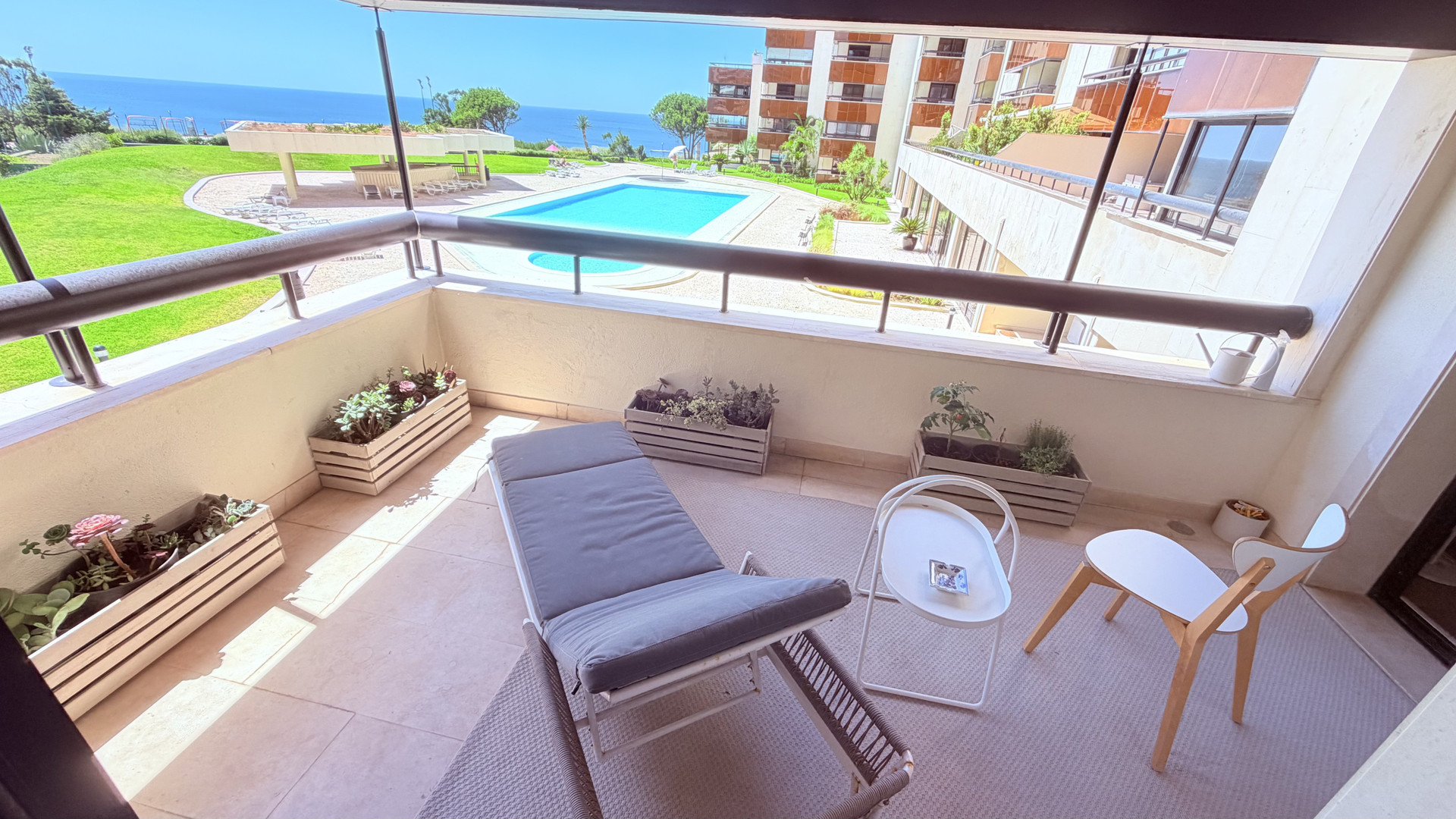 Balcony overlooking pool