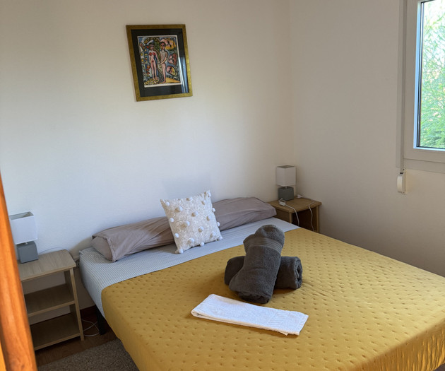Cozy bedroom with double bed