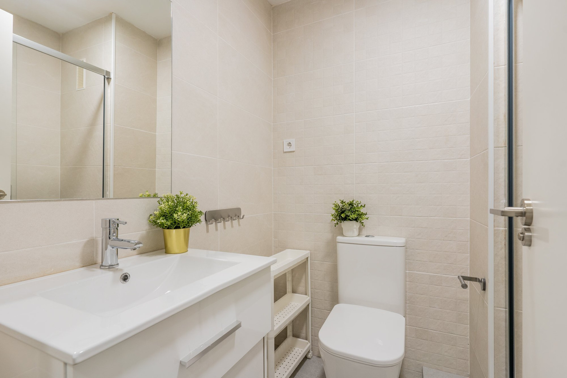Bright bathroom with sink and toilet