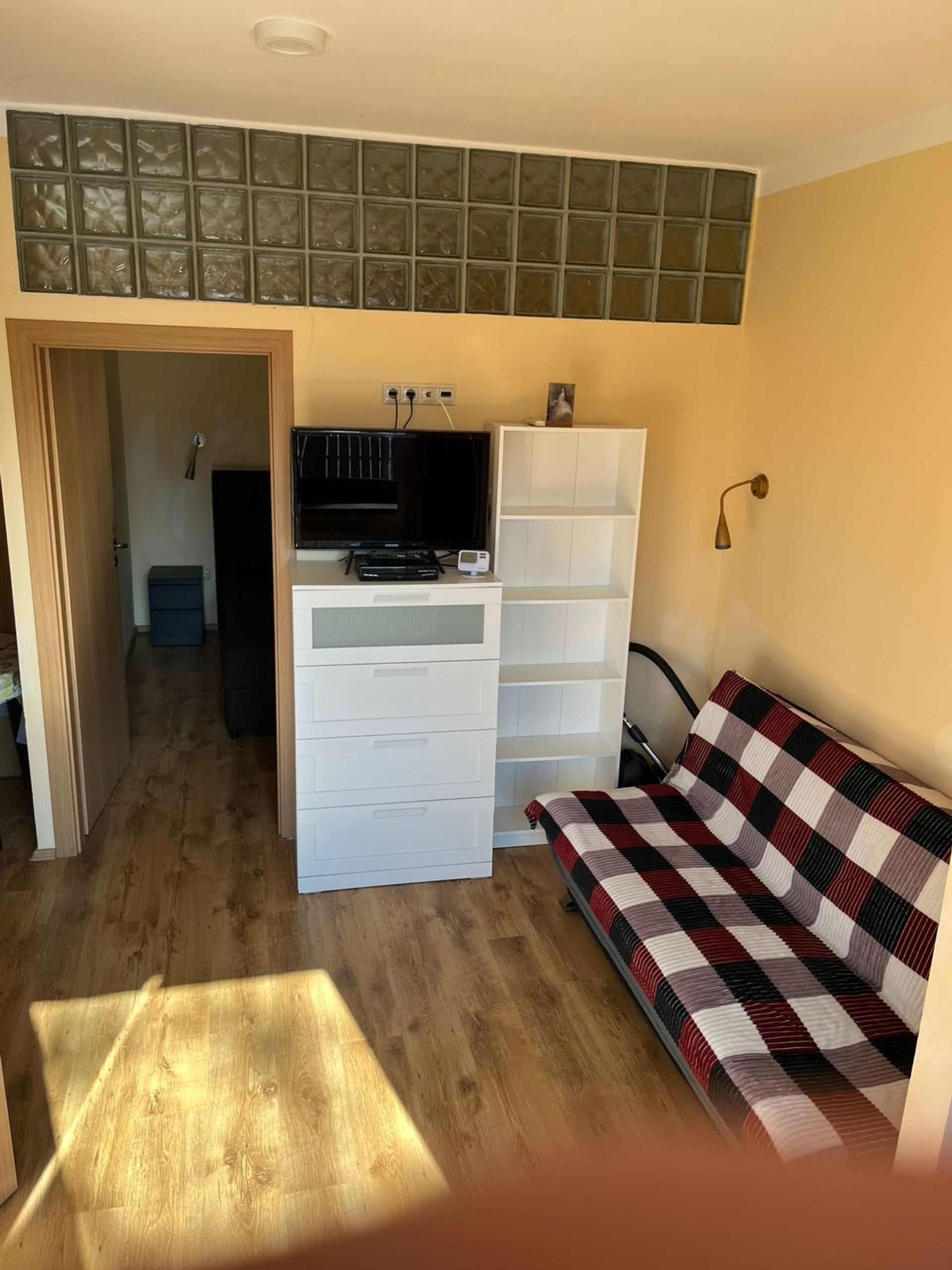 Living area with sofa and TV