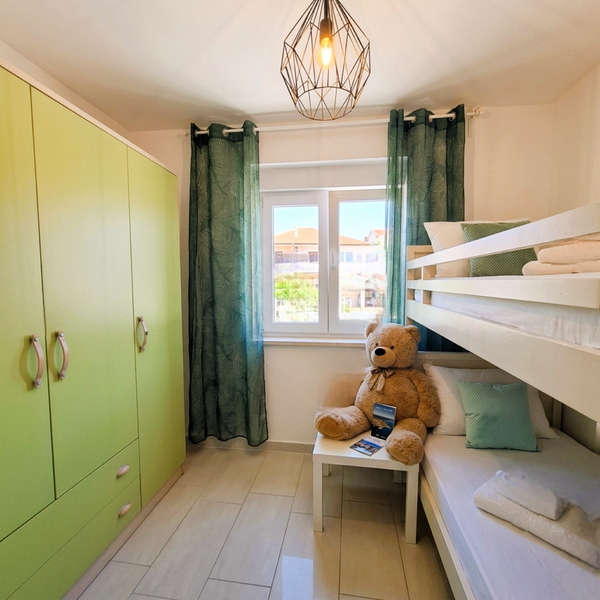 Bunk bedroom with teddy bear