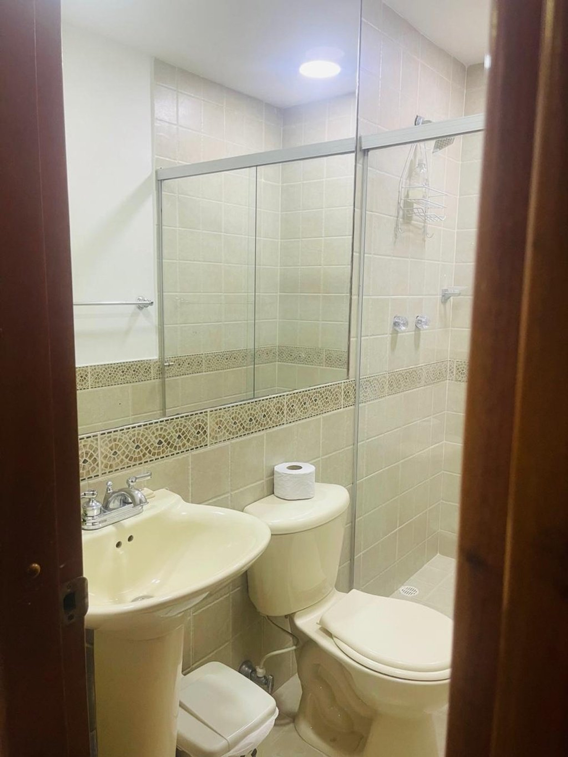 Bathroom with shower and sink