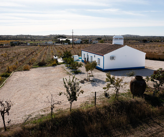 House exterior with gravel yard