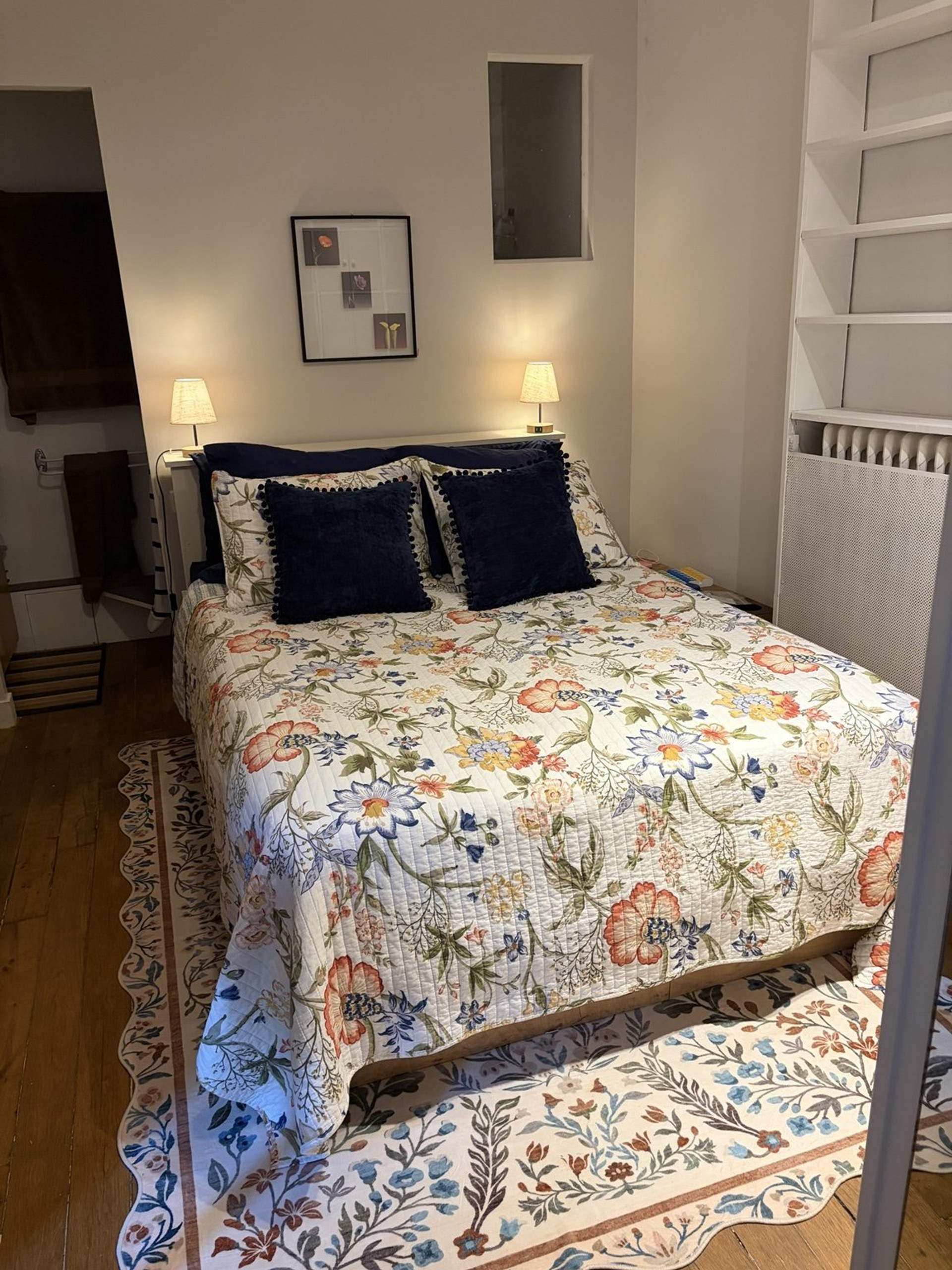 Cozy bedroom with floral bedspread
